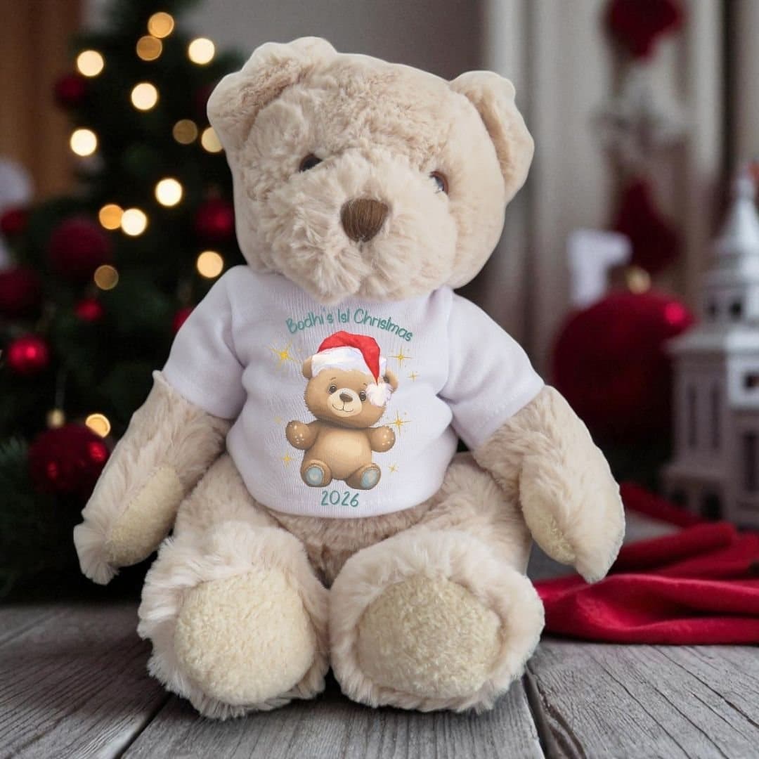 Personalised teddy bear in a Happy 1st Christmas T-shirt
