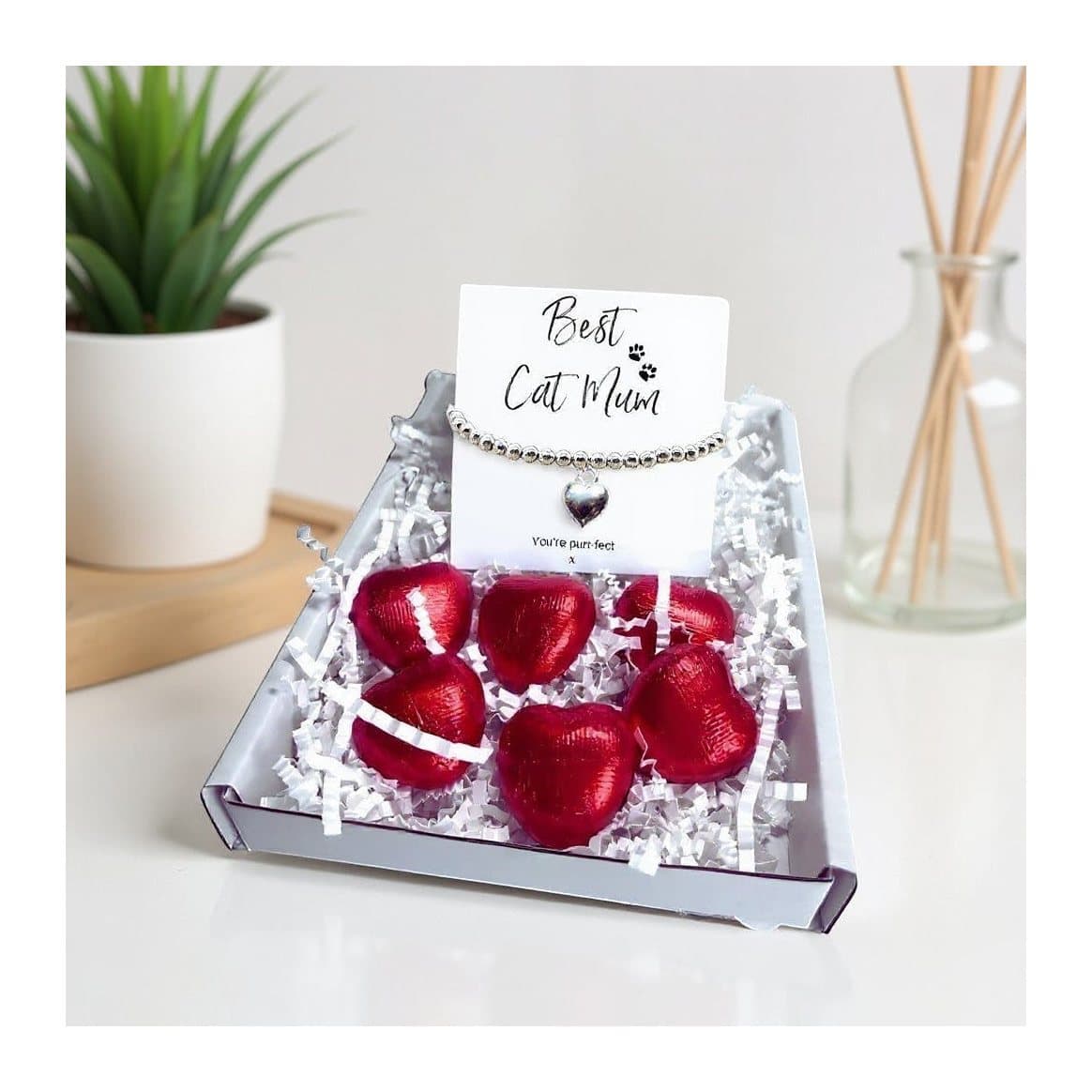 Cat mum gift box with a silver heart bracelet and red foiled chocolate hearts