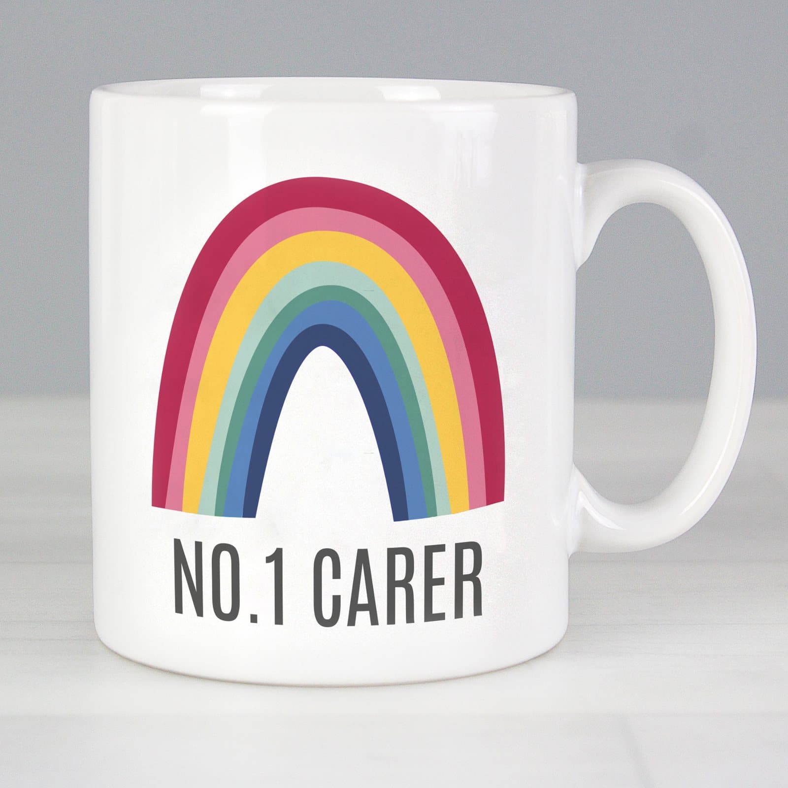 Personalised ceramic mug with a rainbow design