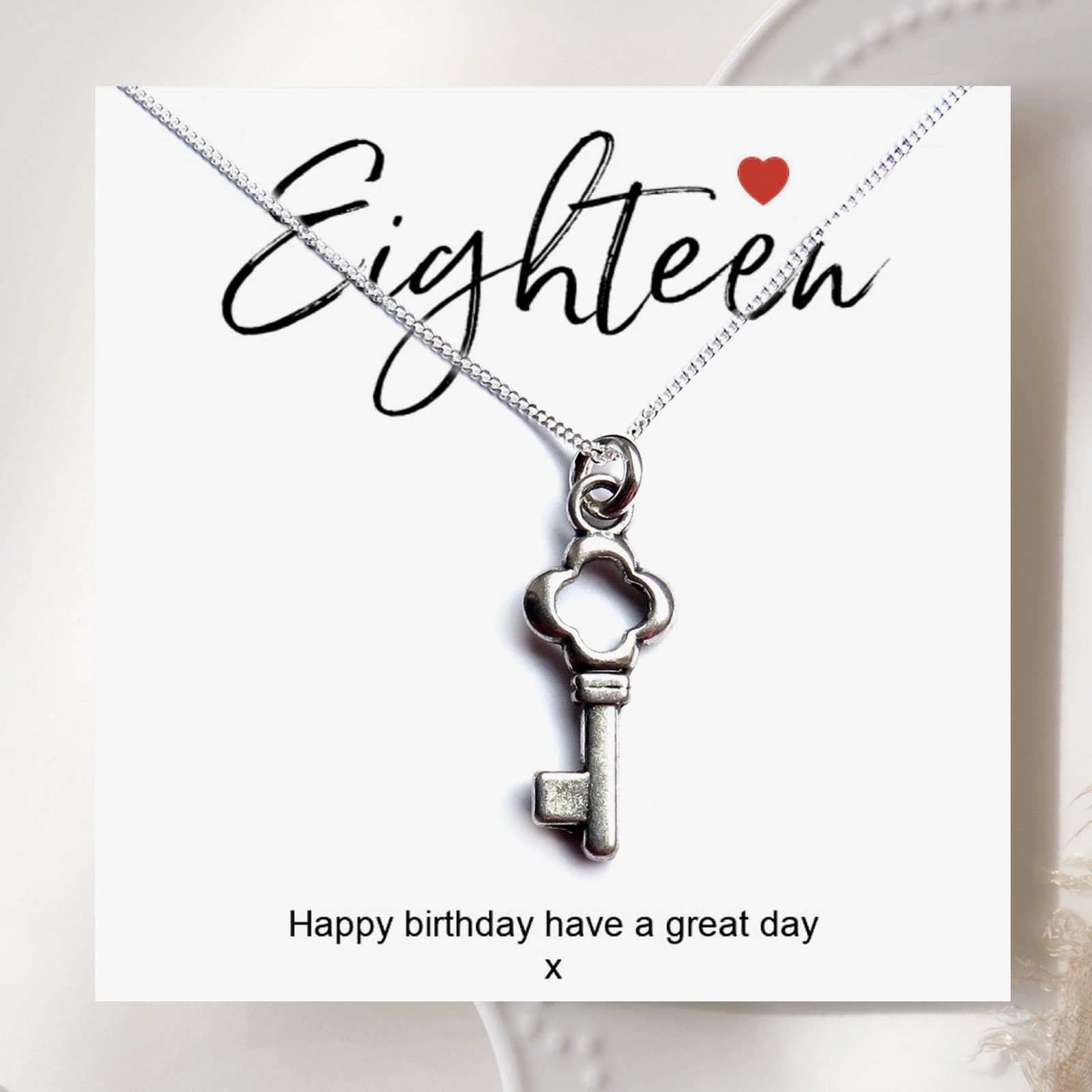 18th birthday key necklace with a silver key charm and birthday card