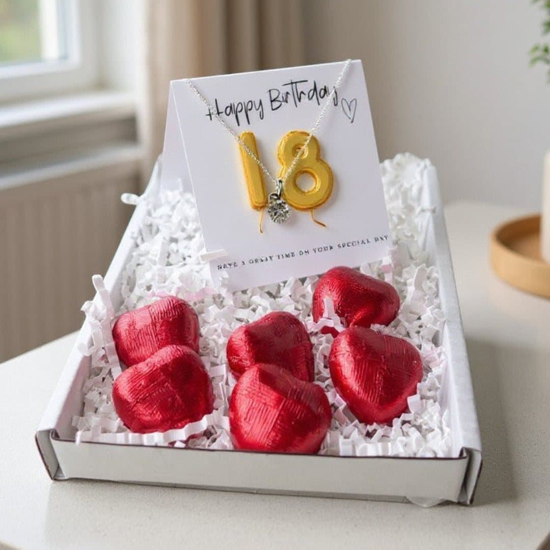 18th birthday gift box with a heart necklace and red foiled chocolate hearts