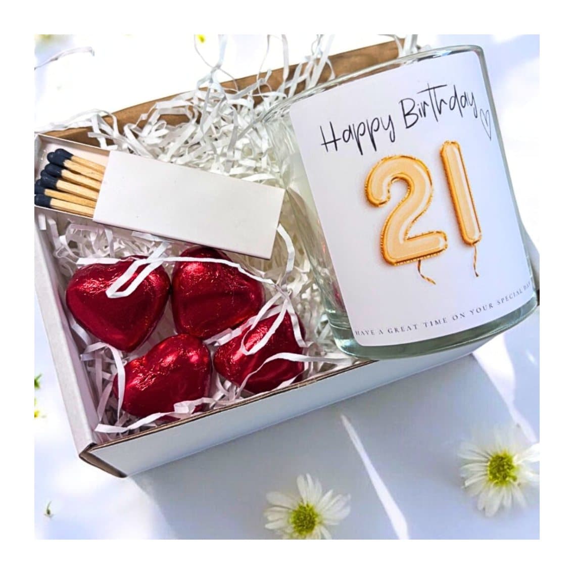 Gold balloon 21st birthday candle set with matches and red foiled chocolate hearts