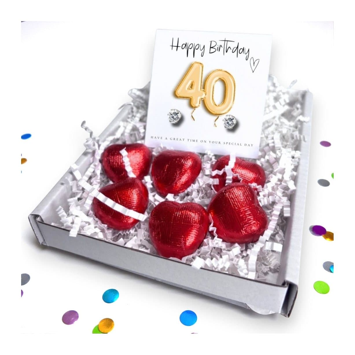 Cubic zirconia stud earrings, milk chocolate hearts and a gold balloons message card