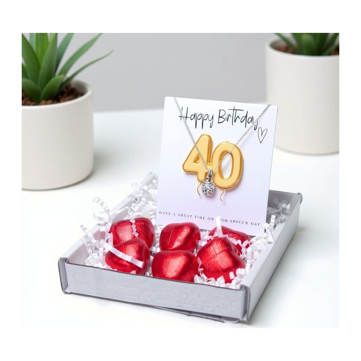 40th birthday gift box with silver necklace and red foiled chocolate hearts