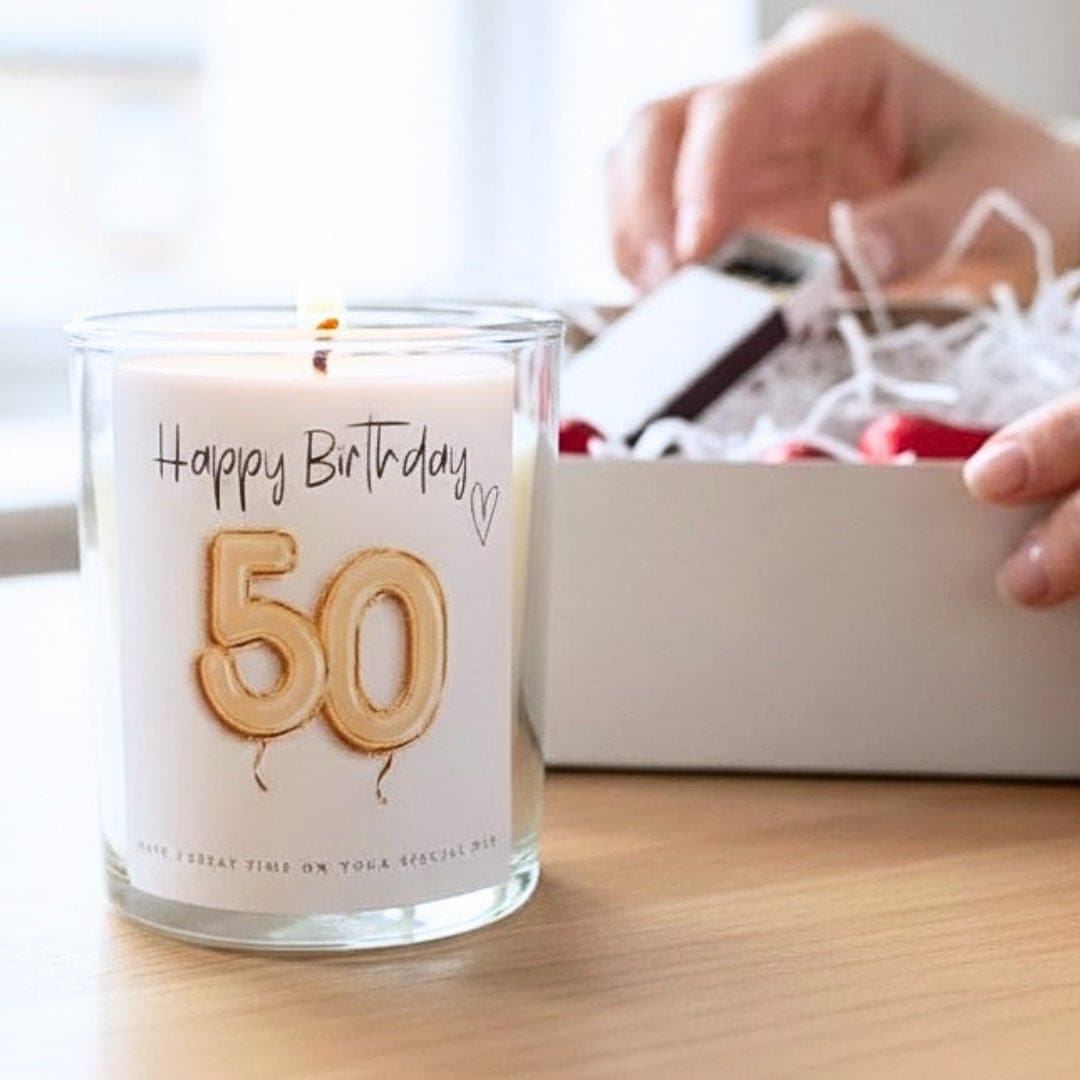 Personalised 50th birthday candle gift set with a gold balloon design