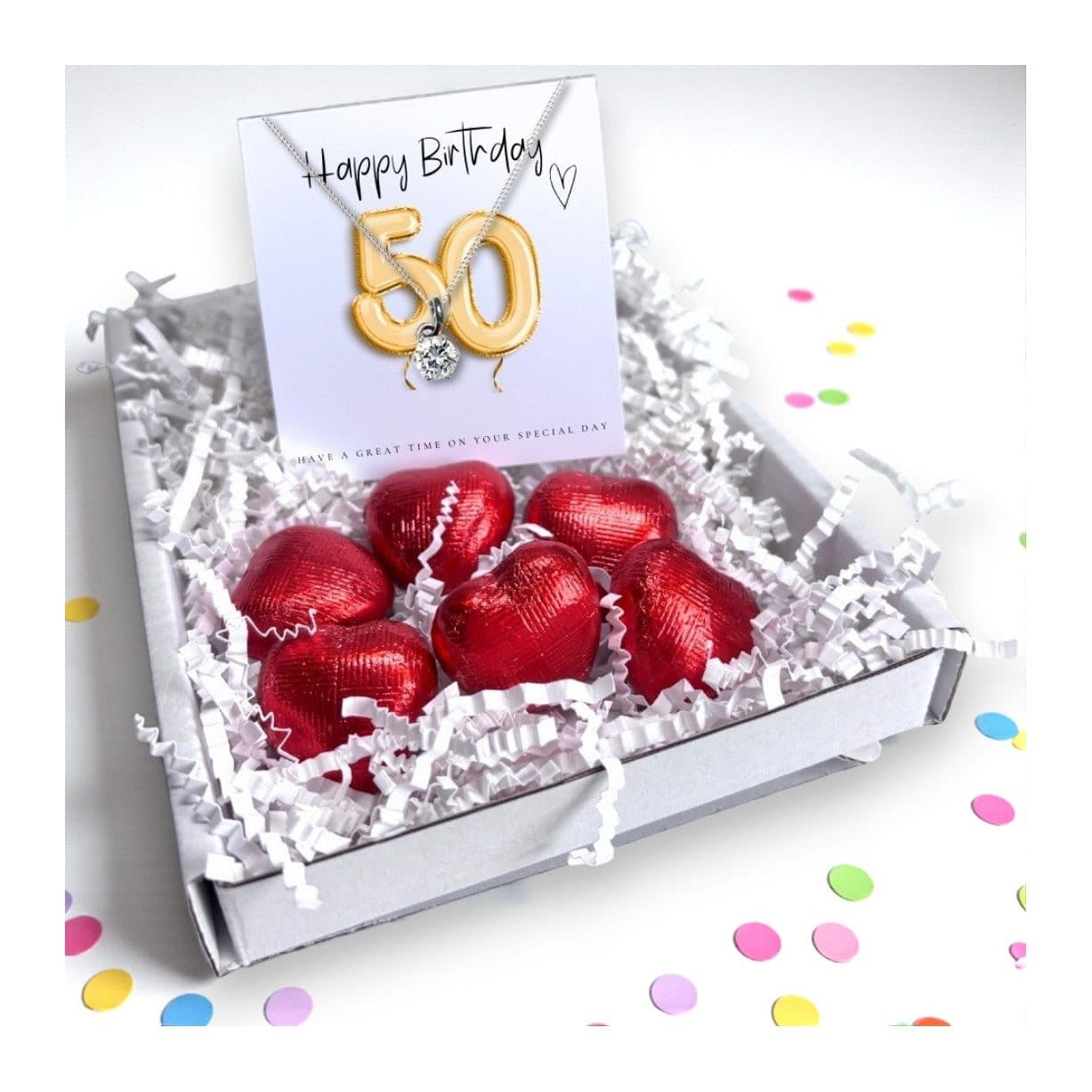 50th birthday gift box with silver cubic zirconia necklace and chocolate hearts
