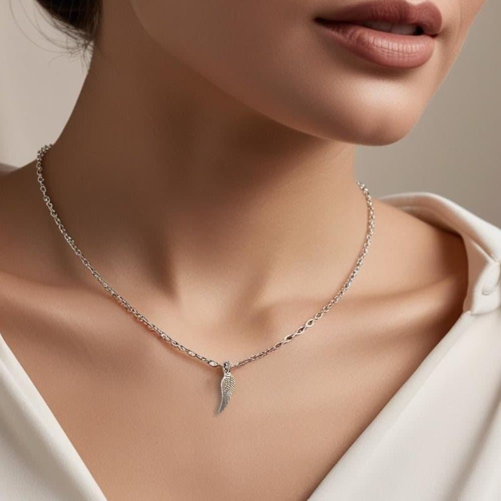 Silver angel wing charm on a sterling silver necklace chain