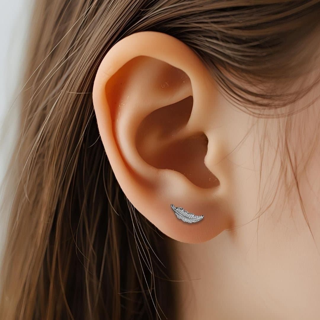 Sterling silver angel feather stud earrings, 12 x 3mm
