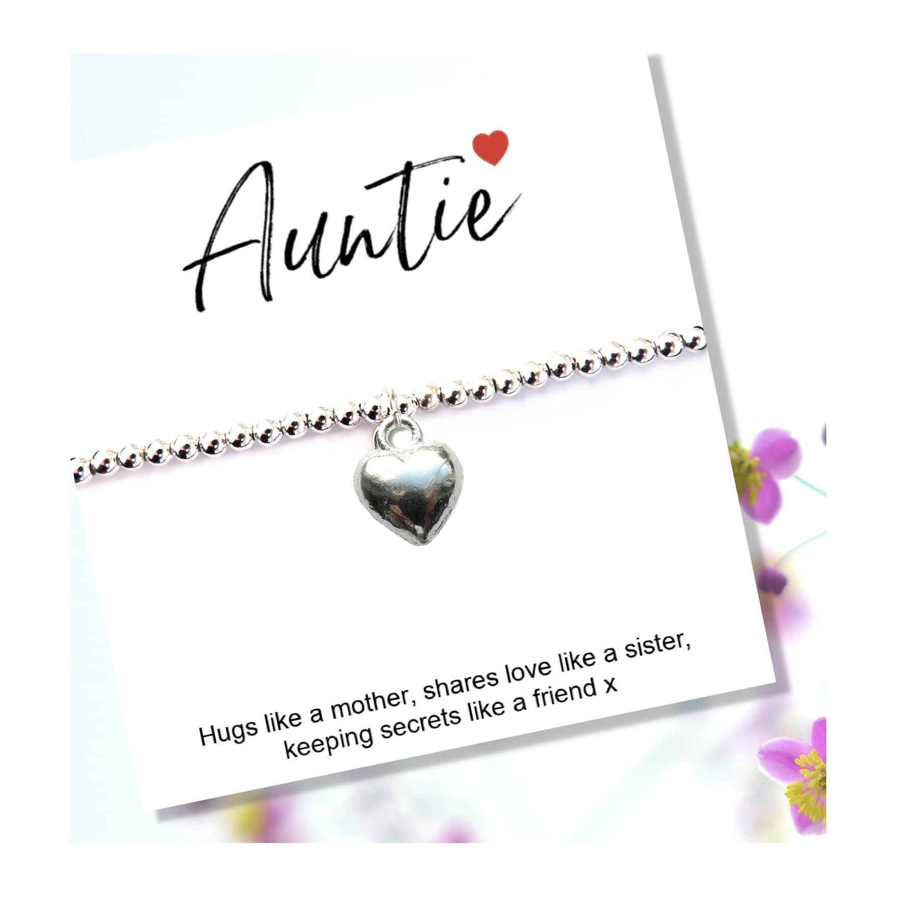 Auntie gift card with a silver heart charm bracelet