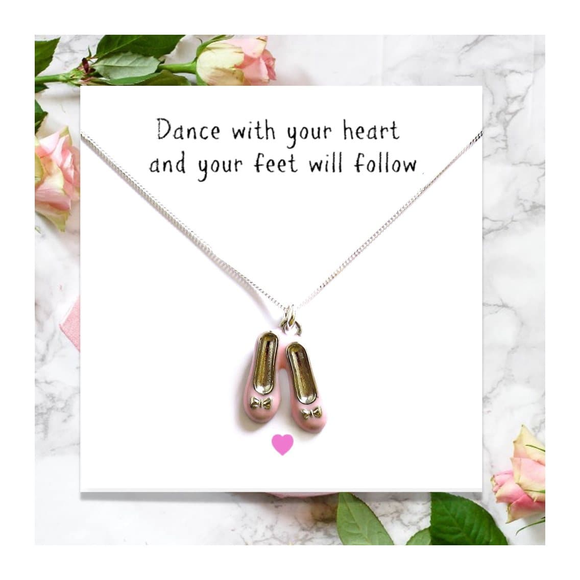Pink enamel ballet shoes on a sterling silver chain, with a message card