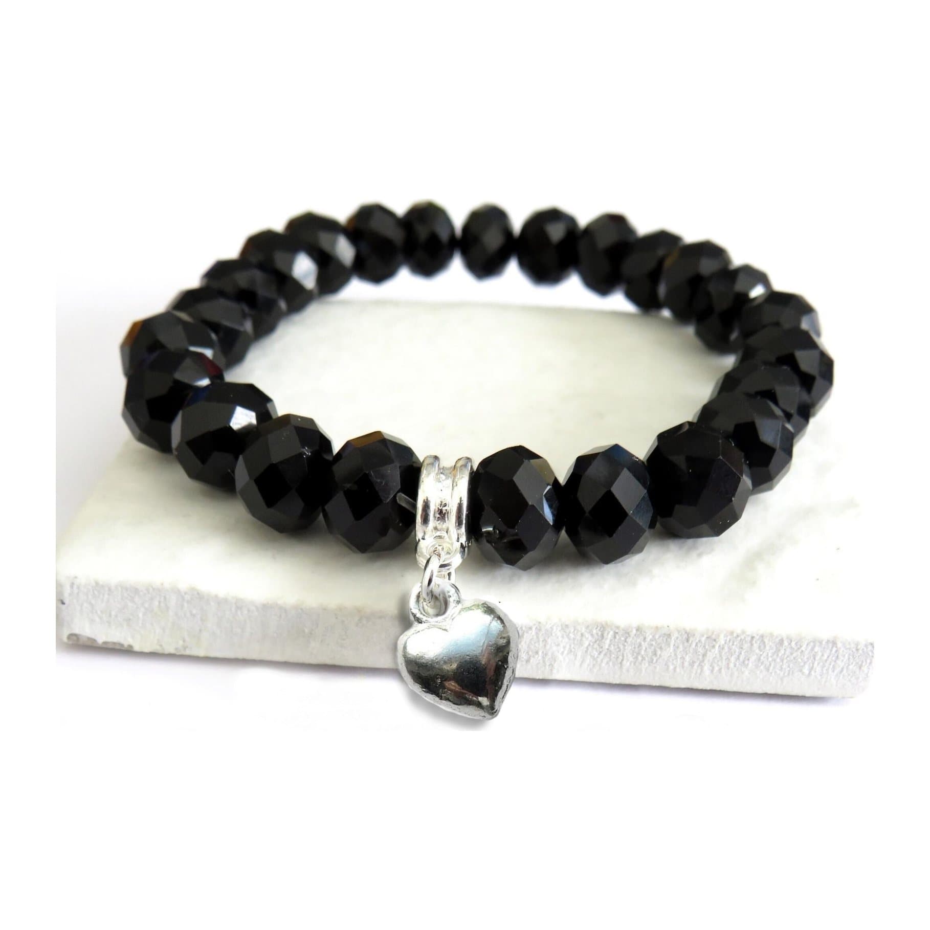 Black crystal beaded stretch bracelet with a silver heart charm