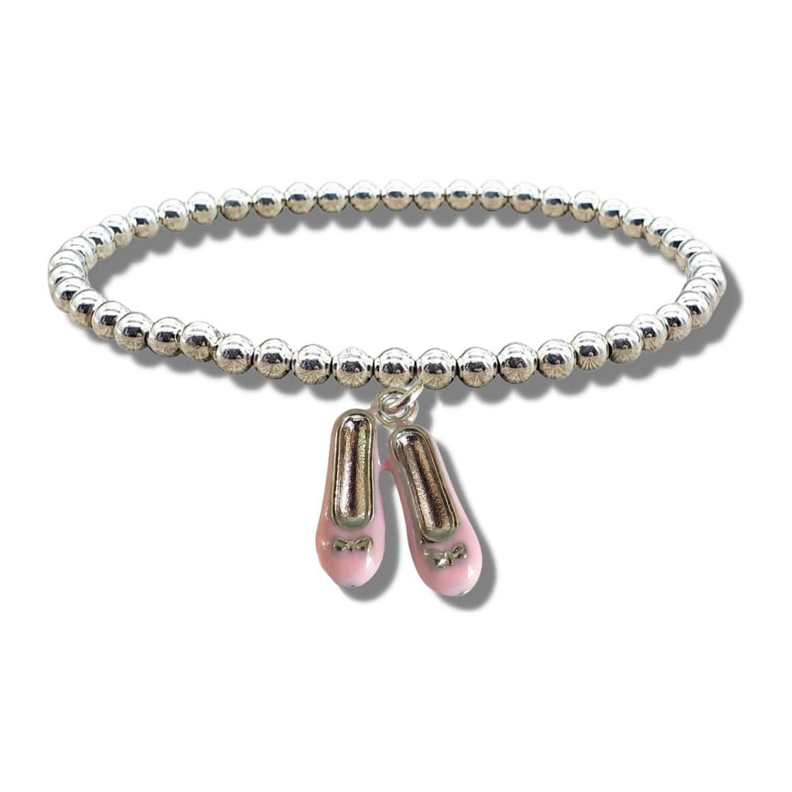 Pink ballet shoes charm on a silver beaded stretch bracelet