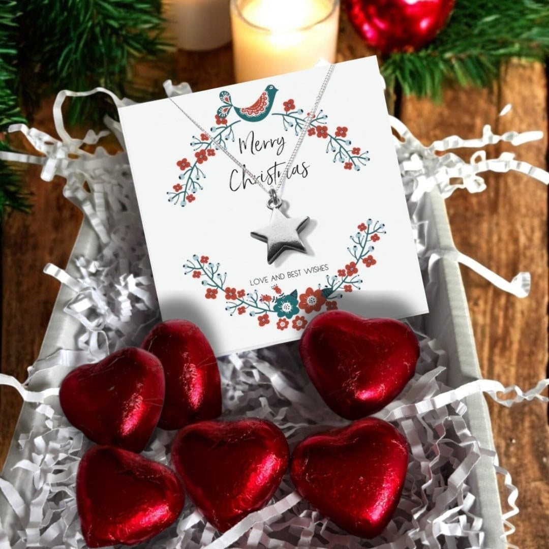 Christmas star necklace gift box with red foiled chocolate hearts