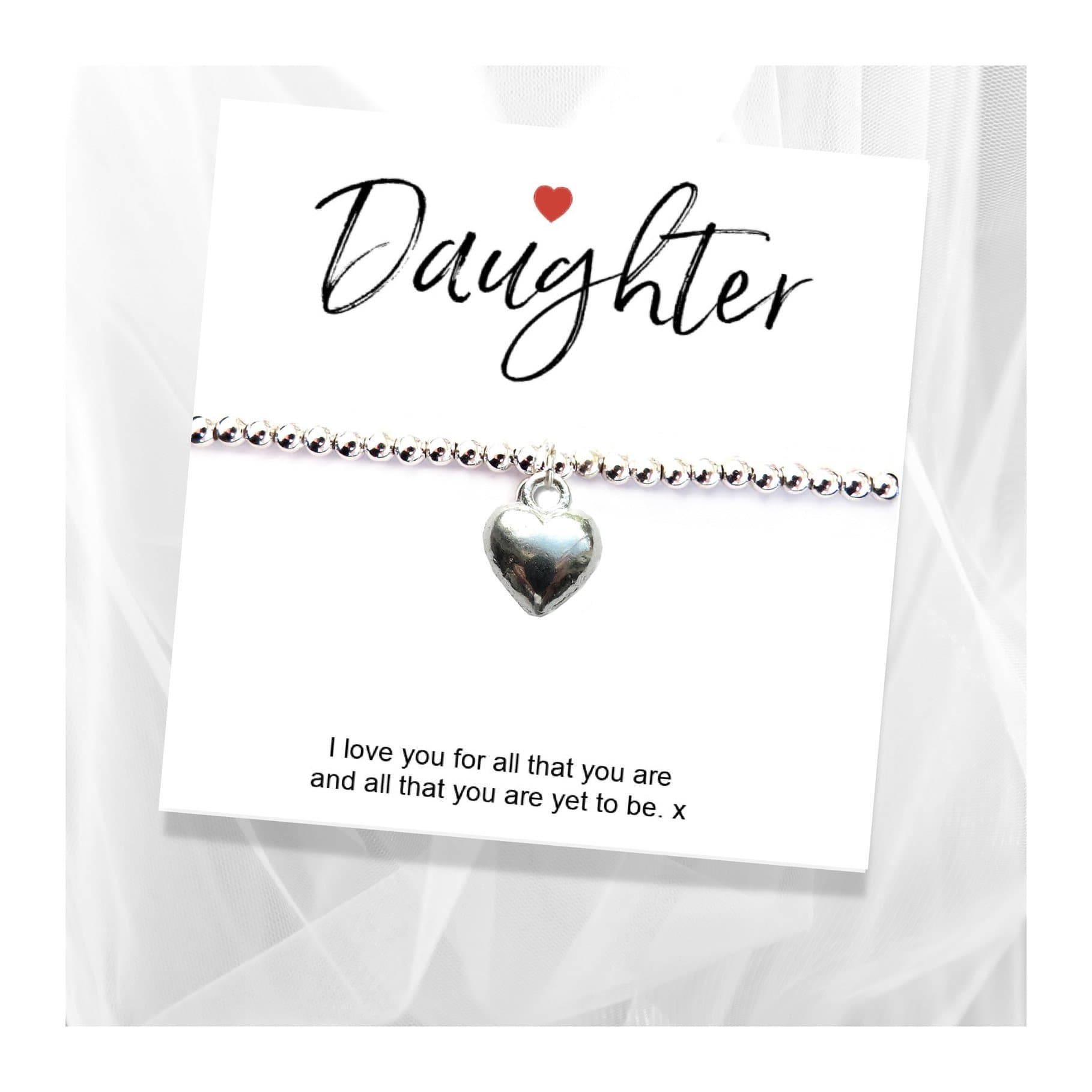 Silver heart charm bracelet presented on a daughter gift card
