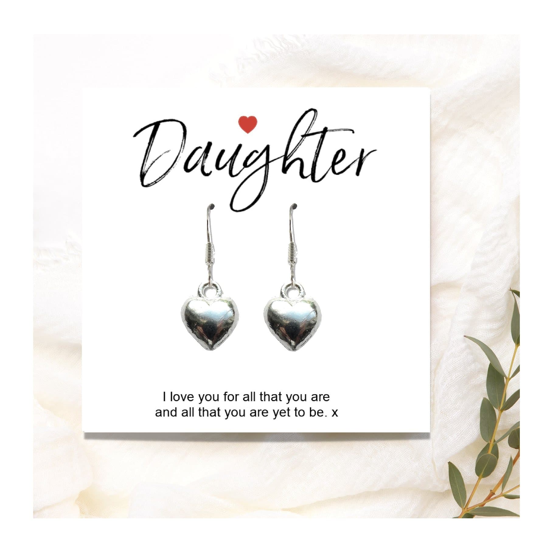 Silver heart earrings presented on a gift card with the words Daughter I love you