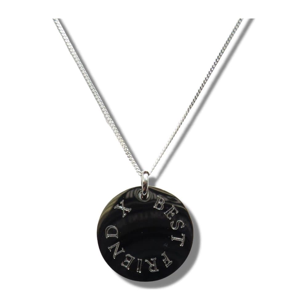 Edge engraved necklace reading BEST FRIEND X on a charm