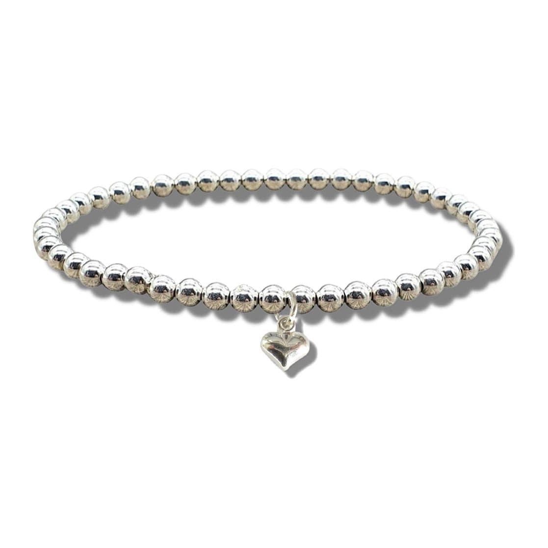 Silver beaded stretch bracelet with a mini puff heart charm