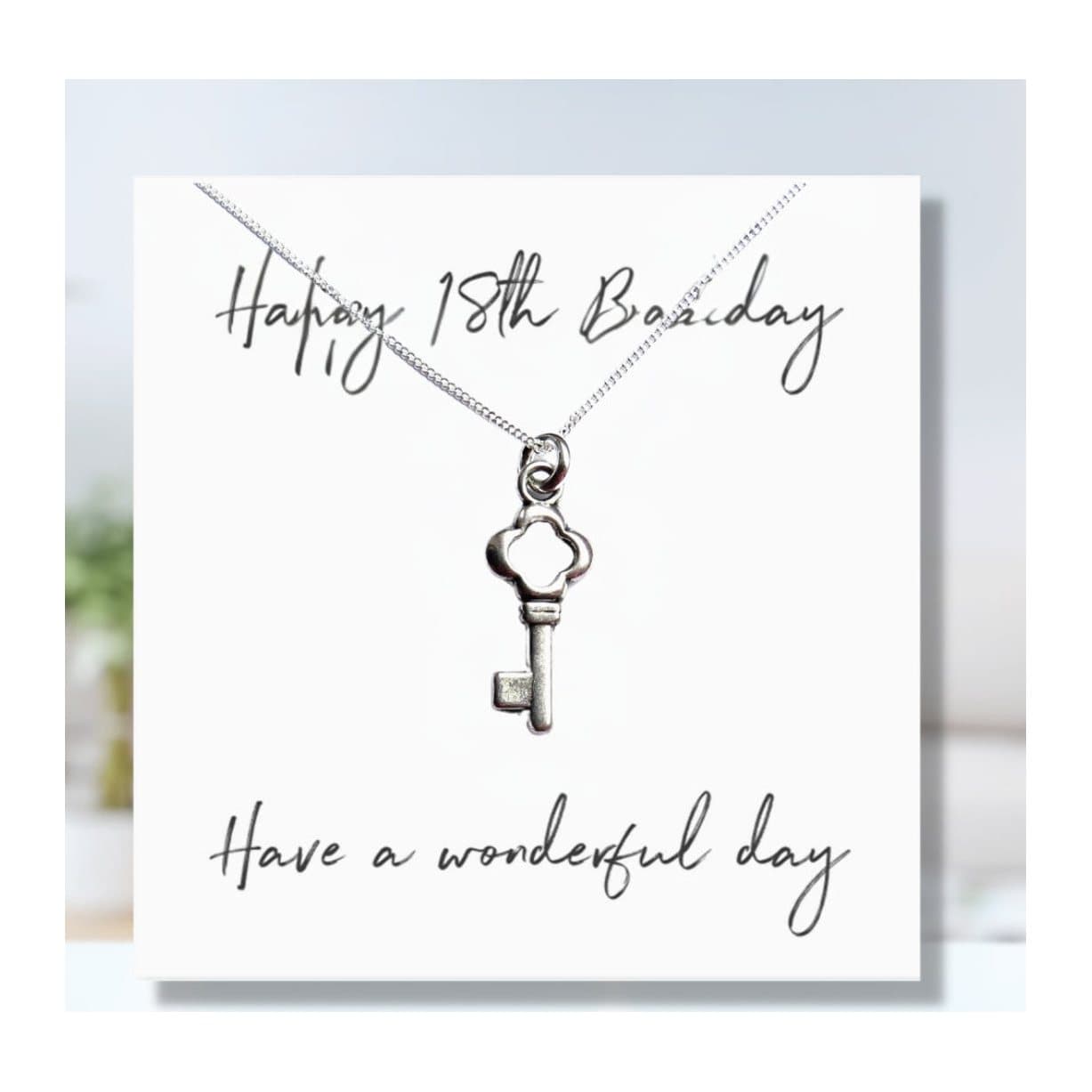 18th birthday necklace with a key charm, beside its Happy 18th Birthday card
