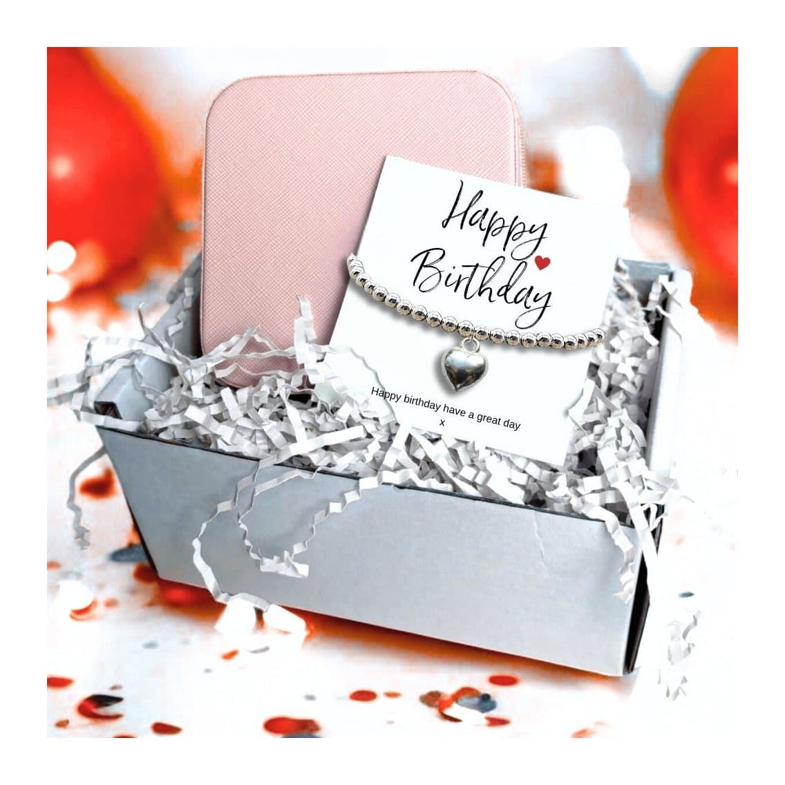 Silver beaded bracelet, pink jewellery box and birthday message card