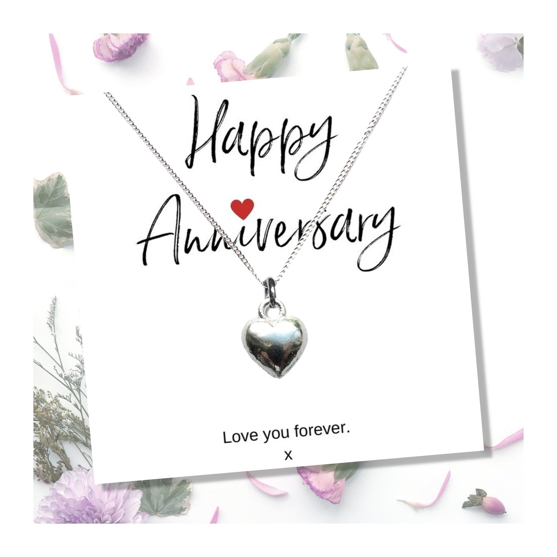 Silver heart necklace on a sterling silver chain with an anniversary gift card