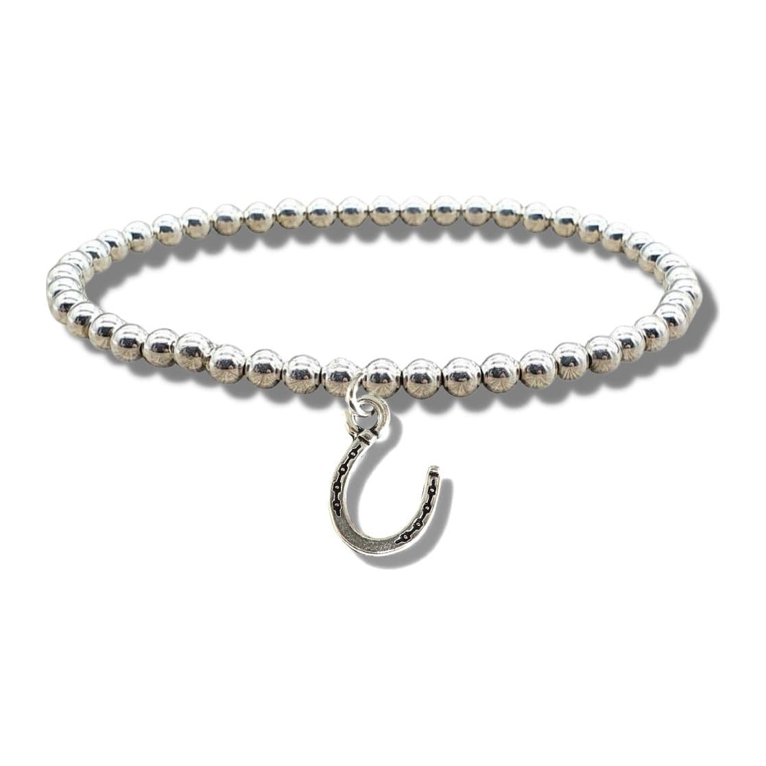 Silver beaded stretch bracelet with a silver plated horseshoe charm