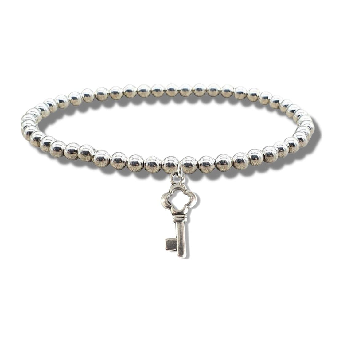 Silver beaded stretch bracelet with a silver plated key charm