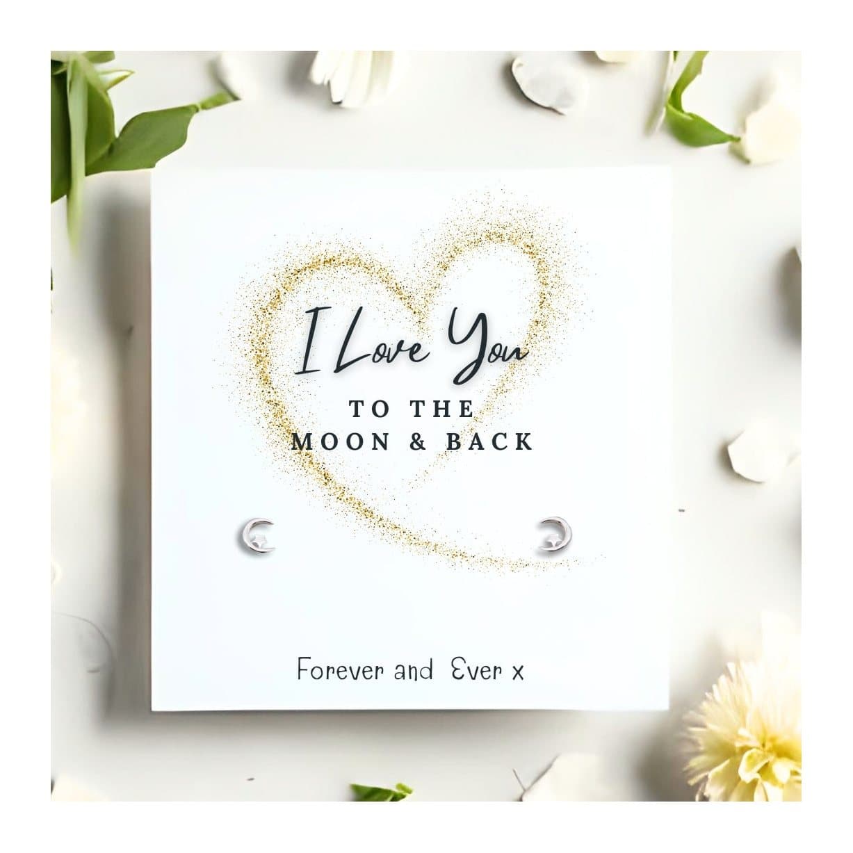 Sterling silver moon and star earrings with a Love You To The Moon and Back card