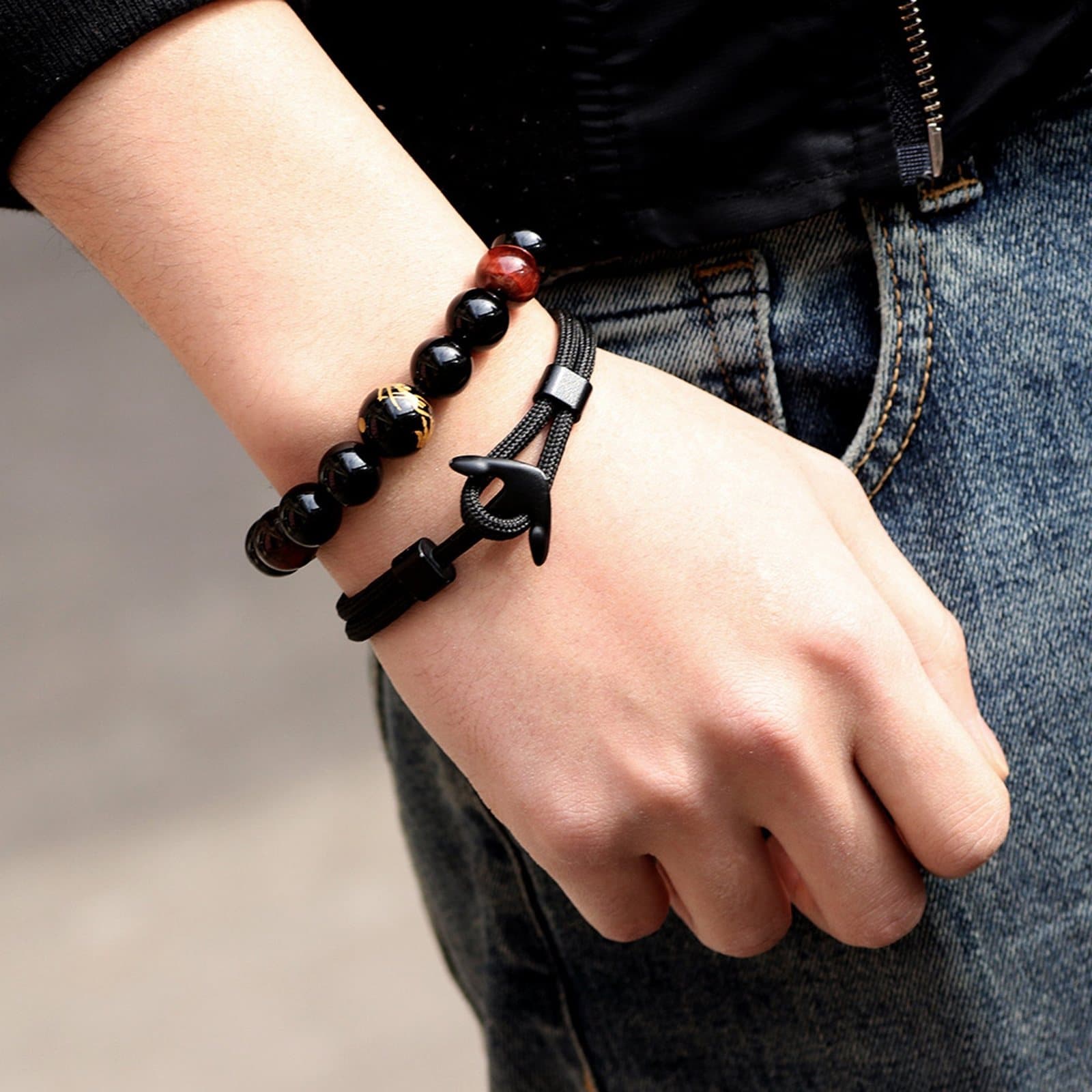 Men's black anchor bracelet with a metal clasp