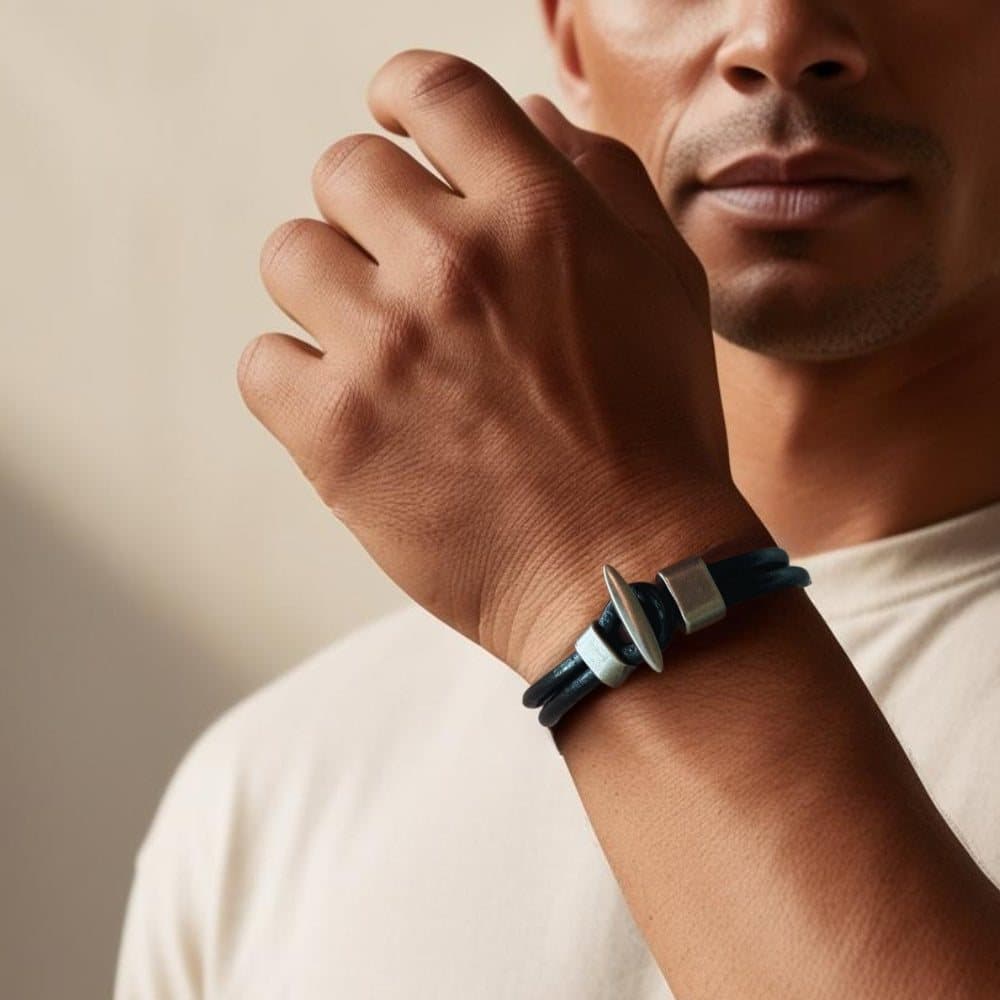 Men's black double-strap leather bracelet with metal accents