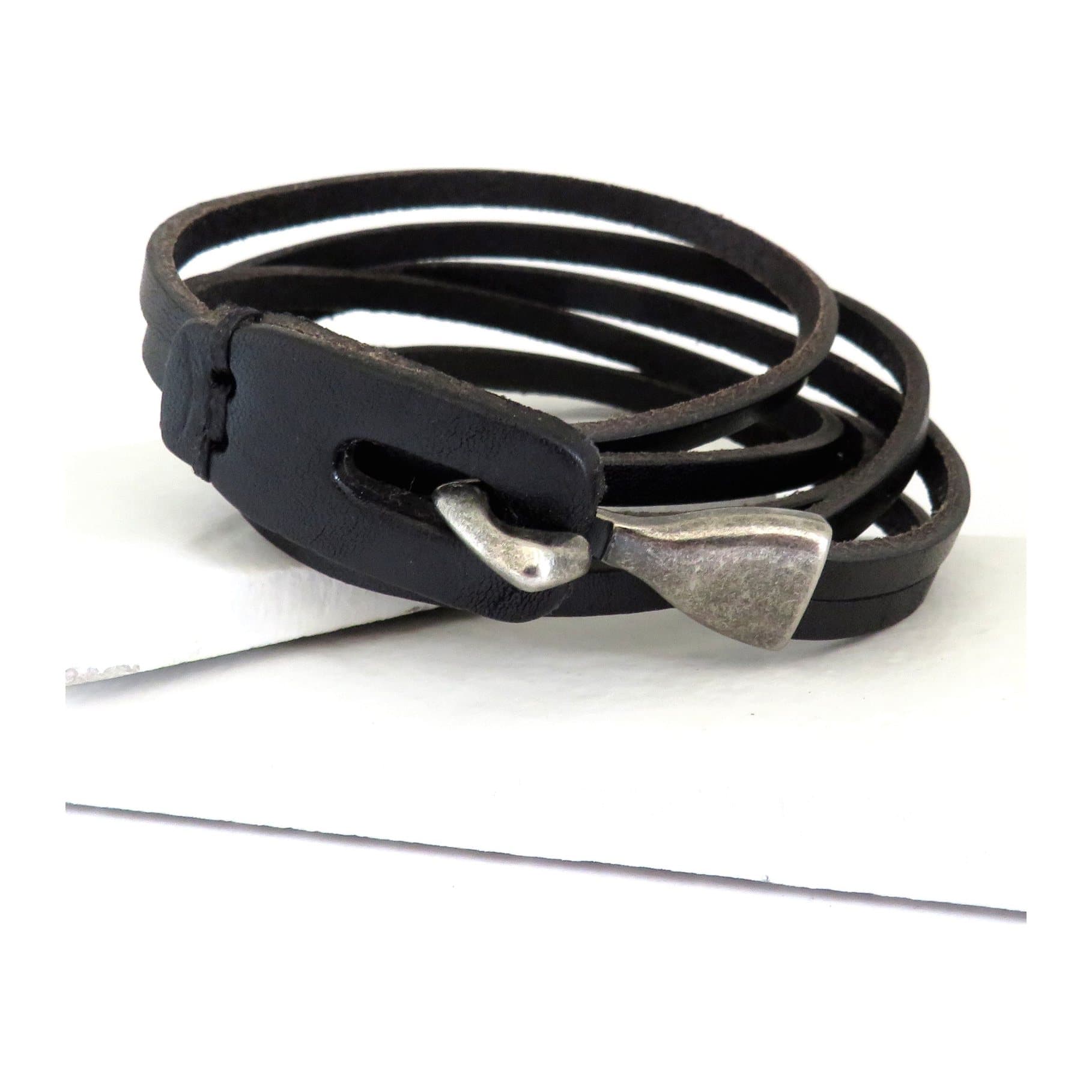 Men's brown leather wrap bracelet with a chunky alloy clasp