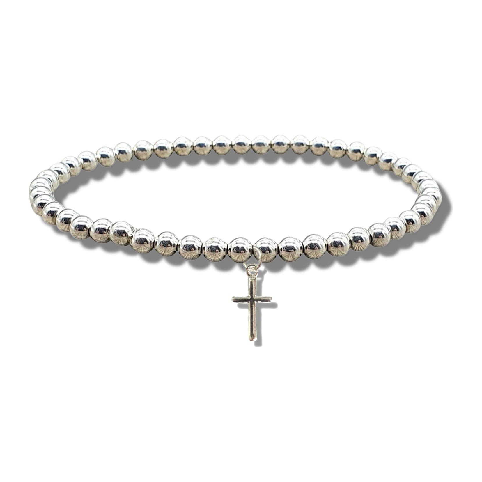 Mini silver cross charm on a silver beaded stretch bracelet