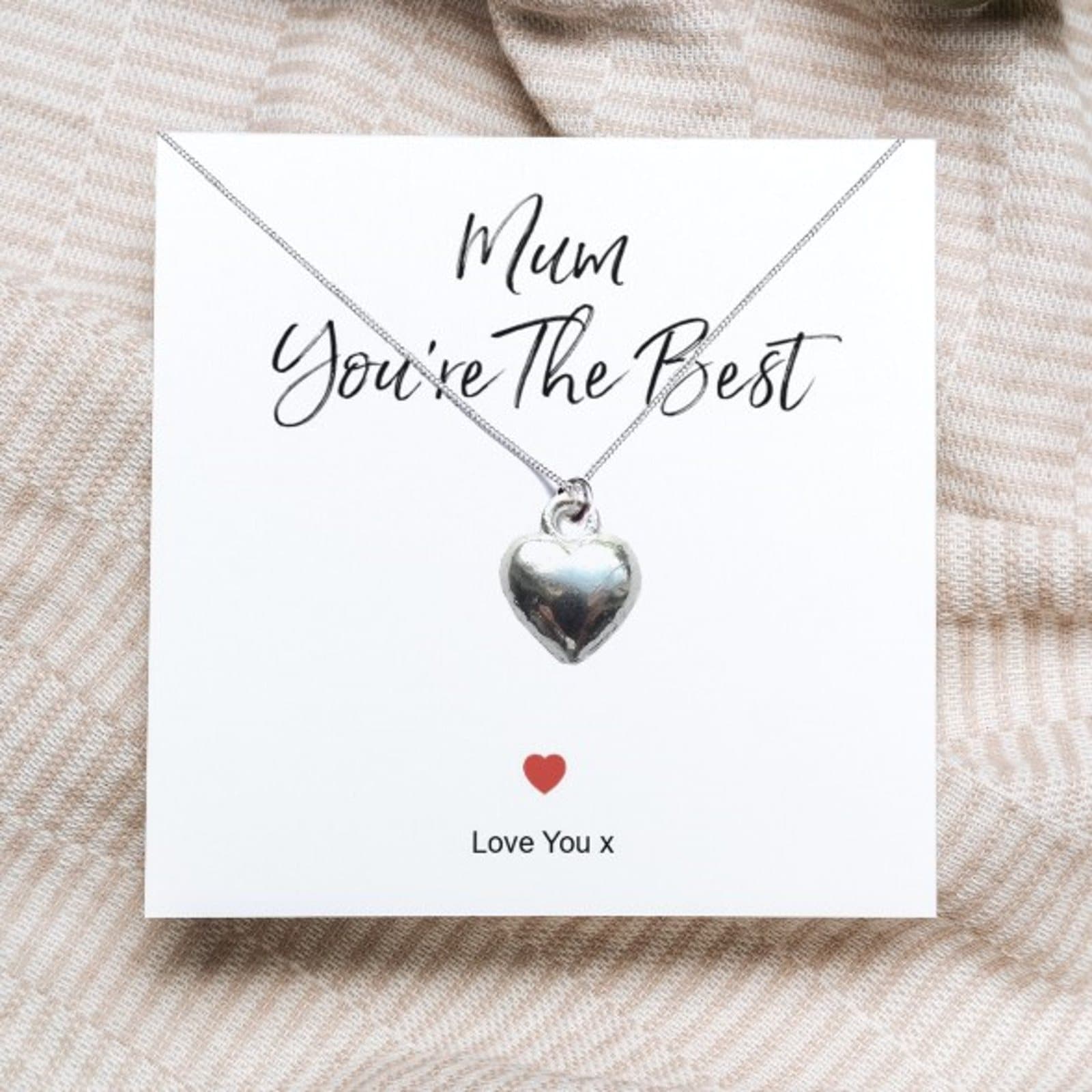 Silver heart pendant necklace on a message card reading Mum You're The Best