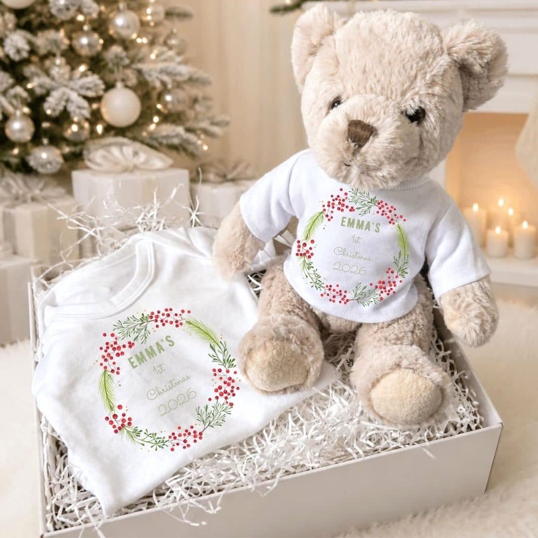 Personalised baby box with a teddy and a vest with a berry wreath design