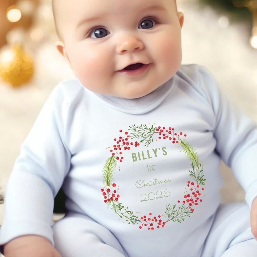 Baby vest with a festive berry wreath 1st Christmas design