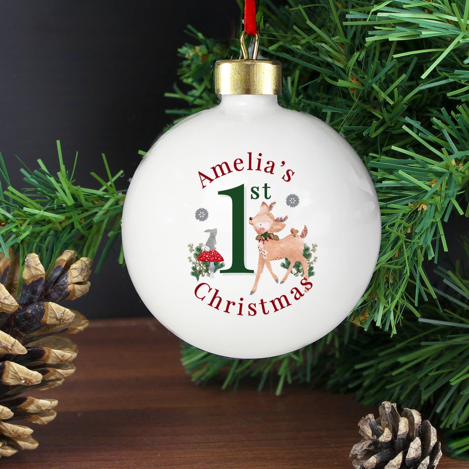 1st Christmas festive fawn bauble with ribbon and a personalised name