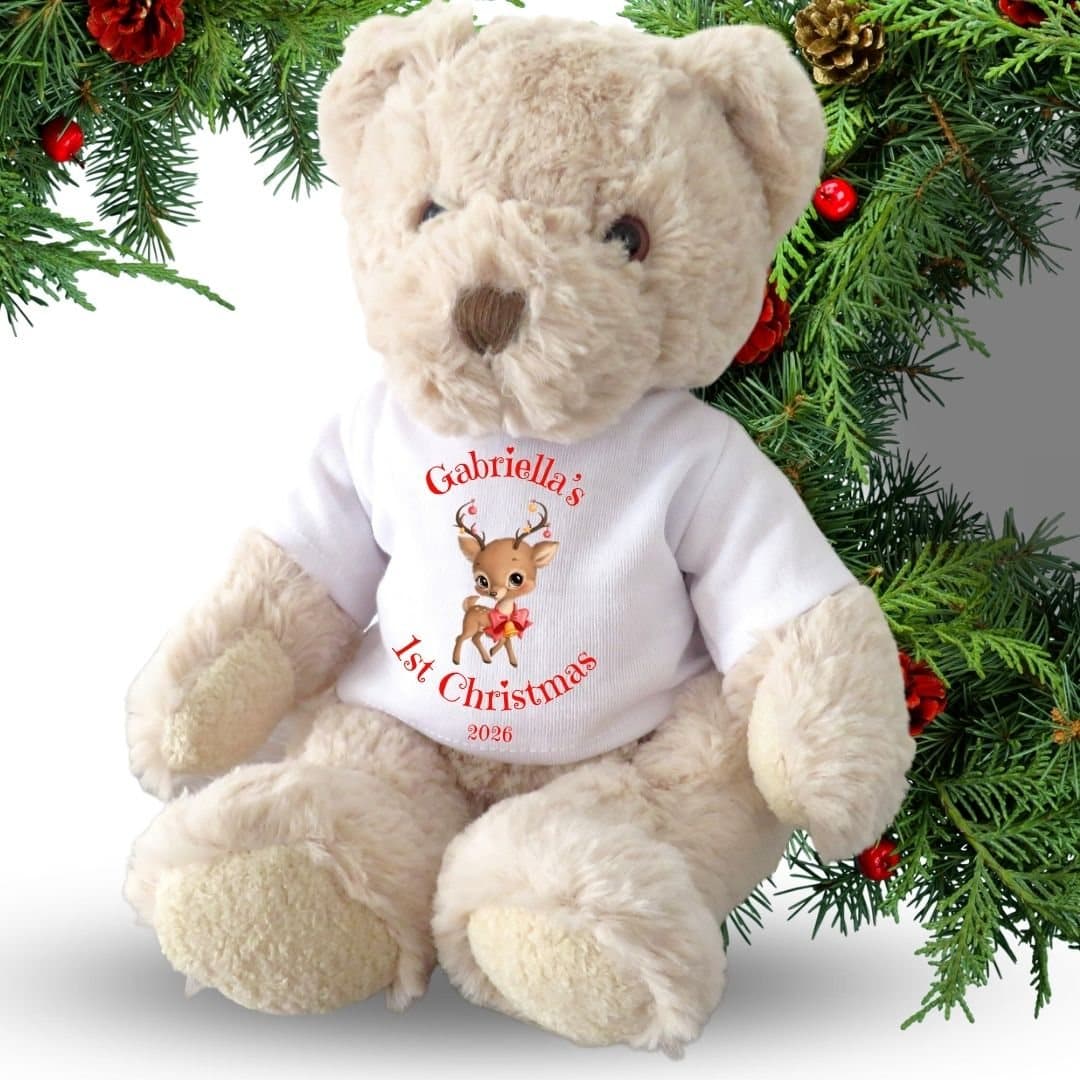 Teddy bear wearing a T-shirt with a reindeer 1st Christmas design