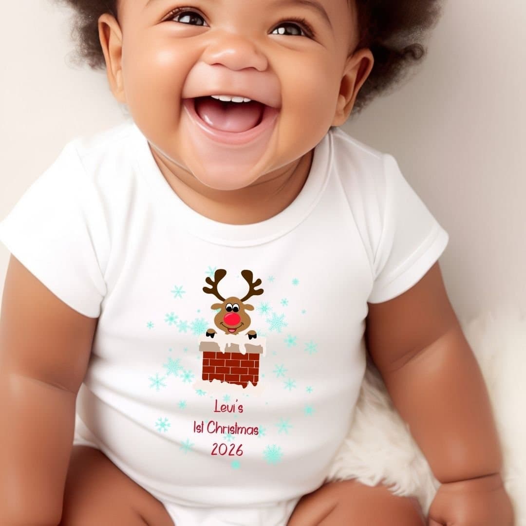 Baby vest with a Rudolph design in a snowy chimney, with a personalised name