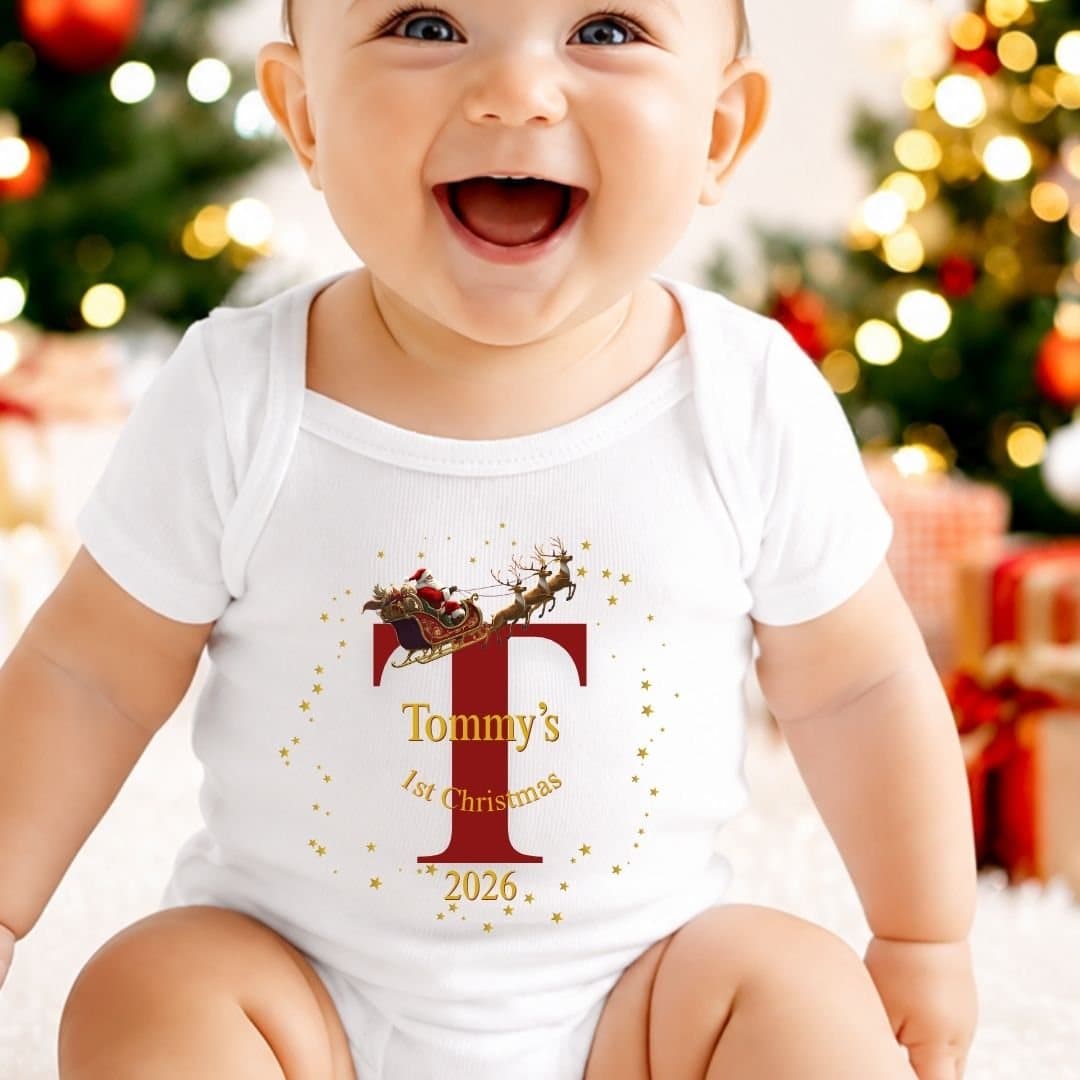 Teddy bear and baby vest with a Santa on his sleigh design