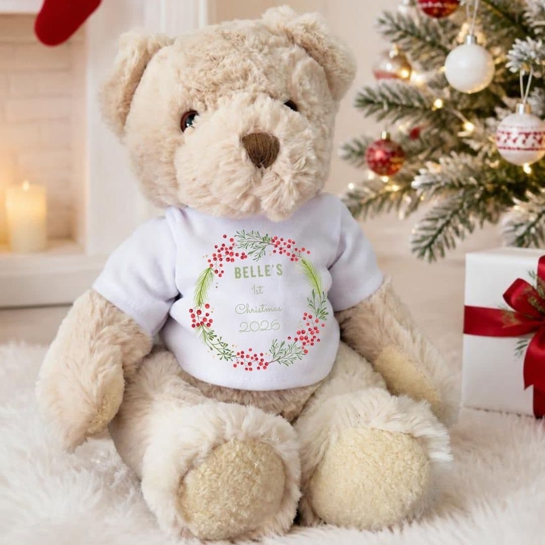 Personalised teddy bear in a T-shirt with a berry wreath 1st Christmas design