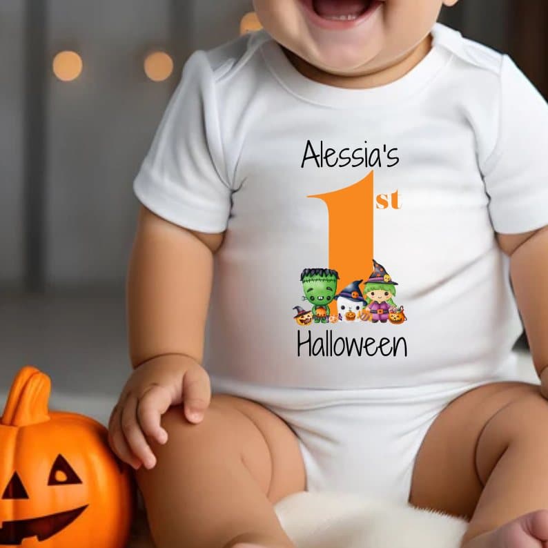Personalised 1st Halloween babygrow with a name and three Halloween characters