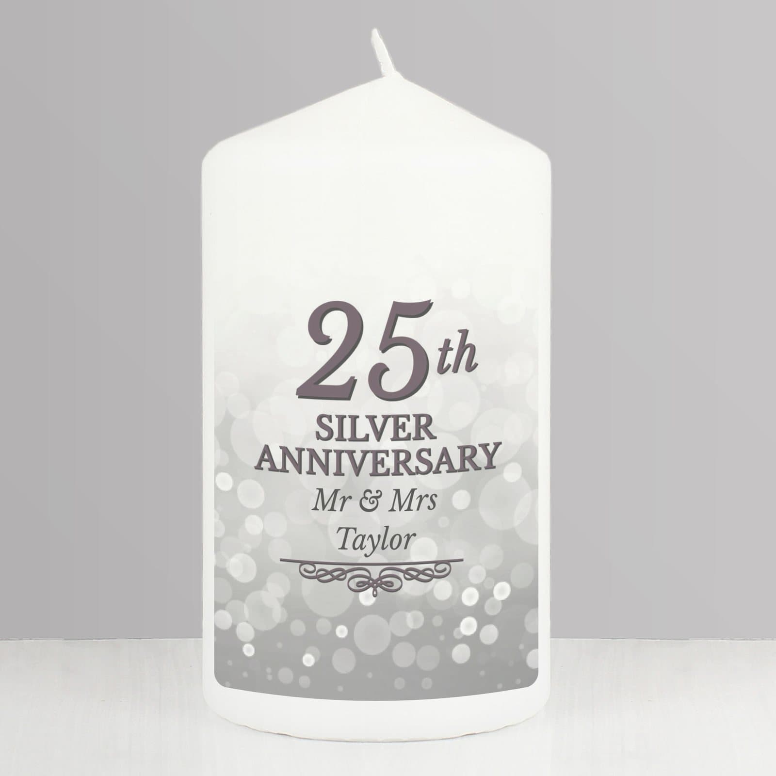 Silver anniversary pillar candle in an organza bag