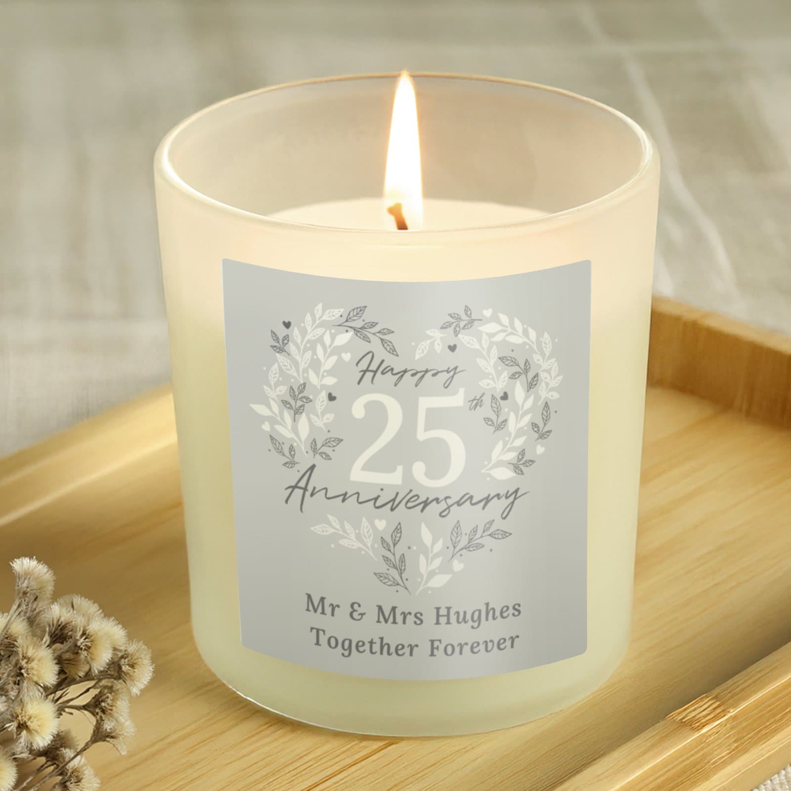 Vanilla candle jar with a 25th Anniversary design