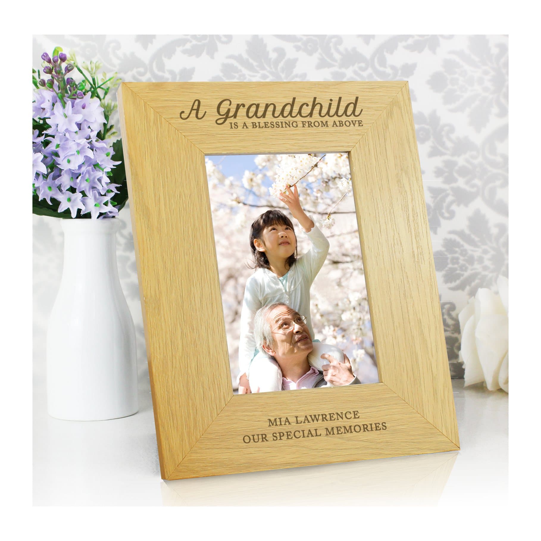 Oak finish portrait photo frame with A Grandchild is a blessing text
