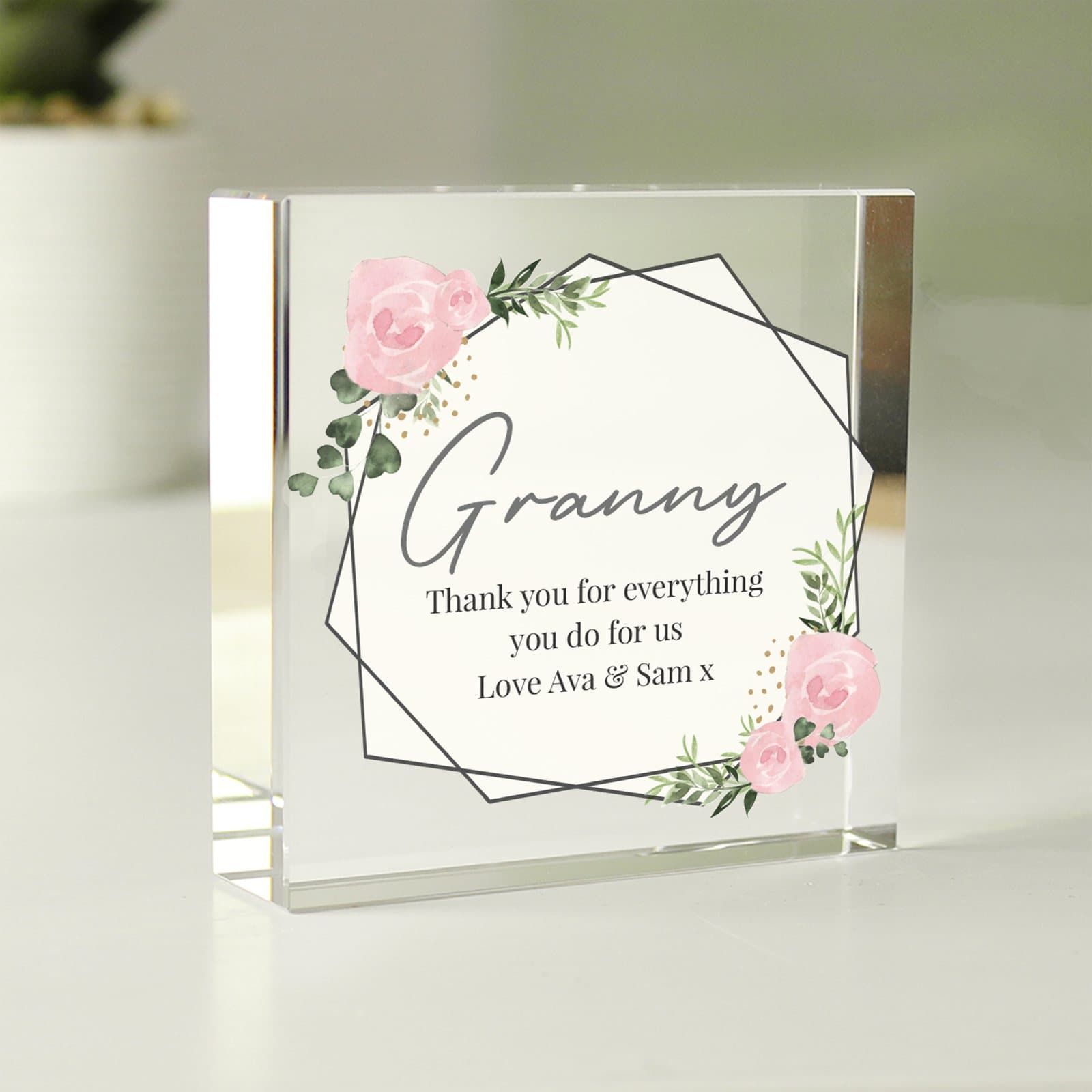 Floral glass token with personalised lines of text