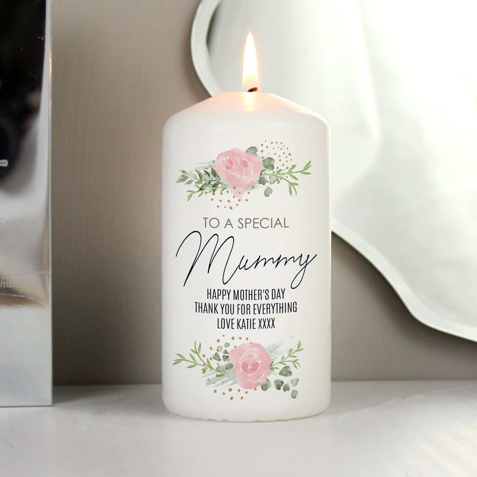 Abstract rose floral pillar candle personalised with text, in an organza bag