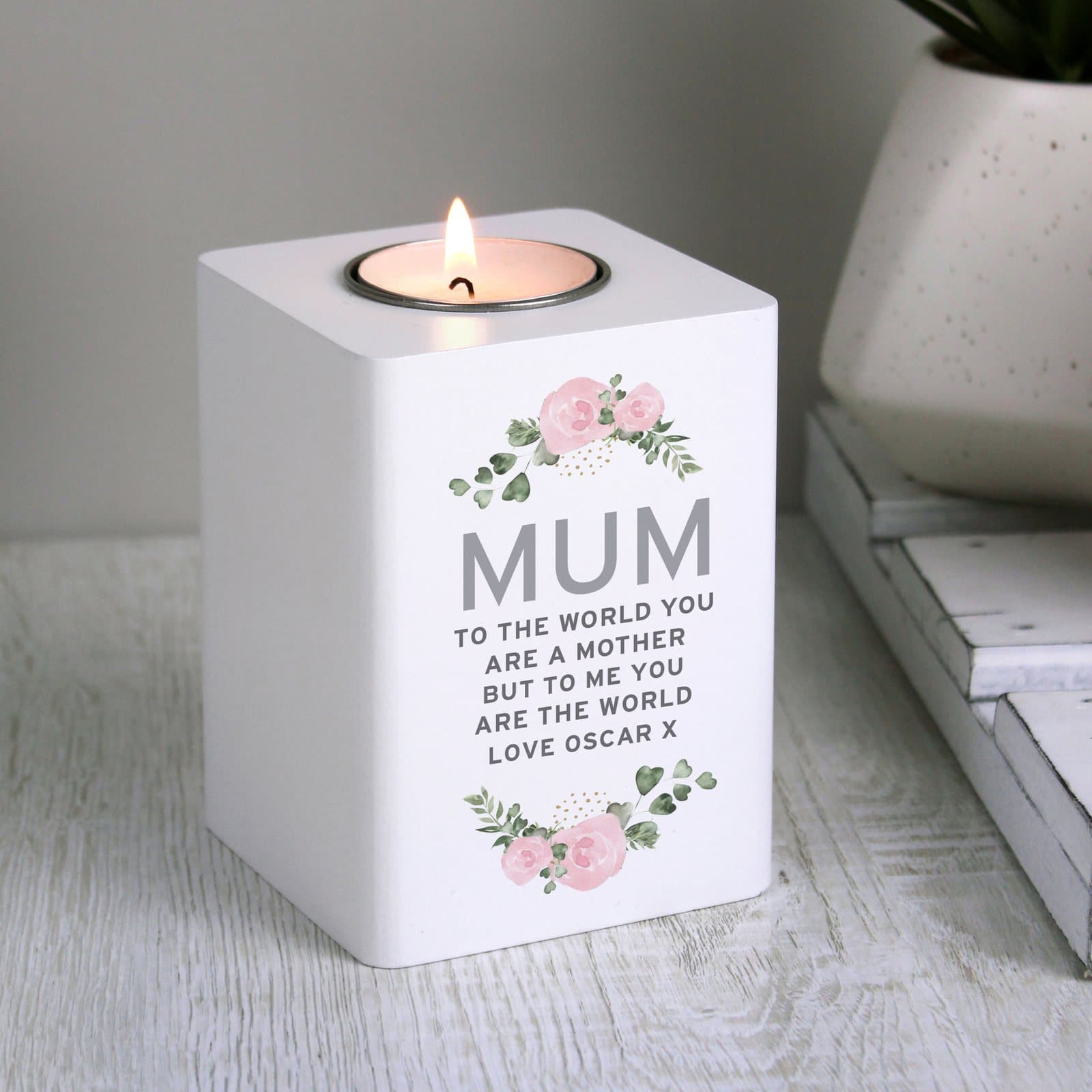 White wooden floral tea light holder with personalised text