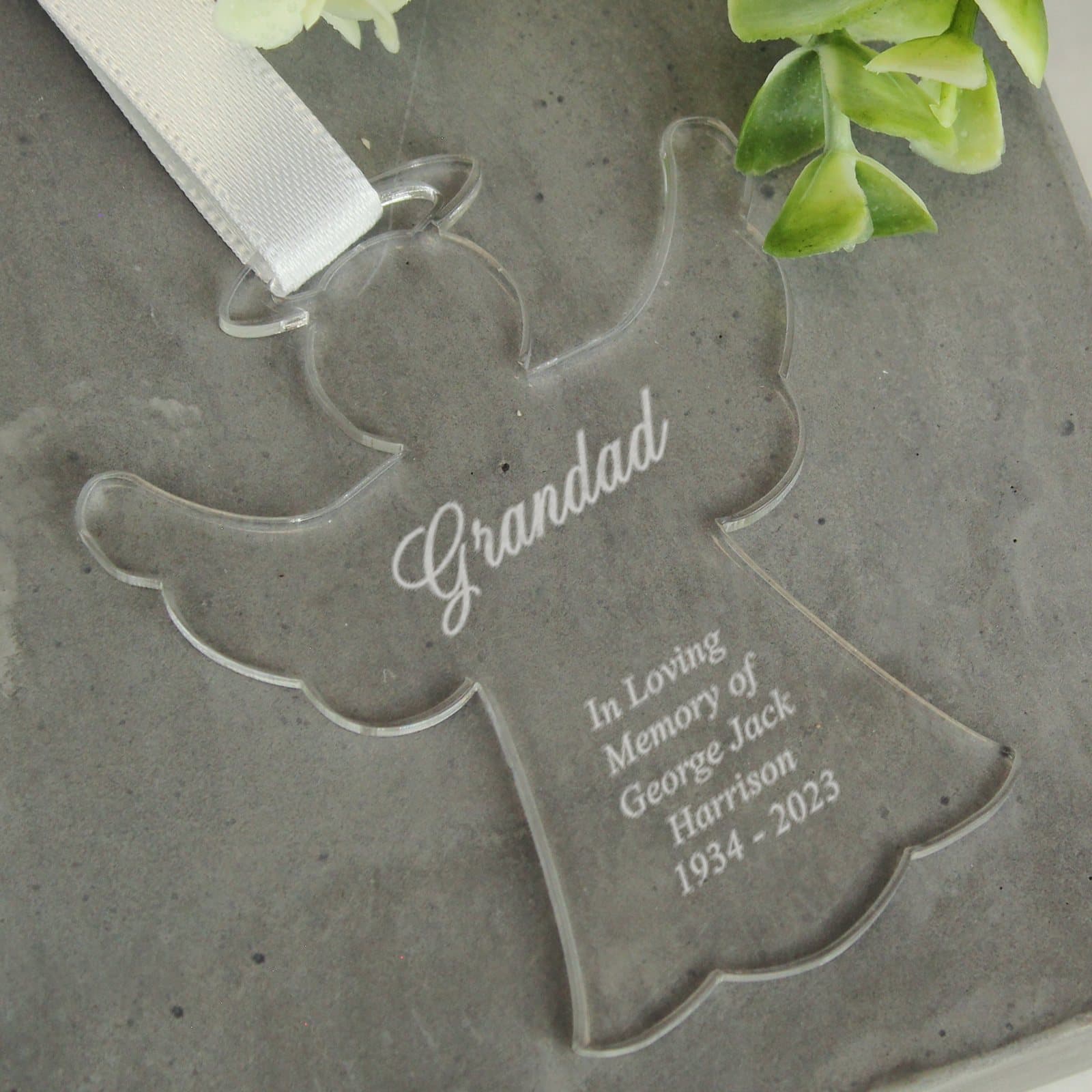 Acrylic angel decoration with white ribbon and lines of text