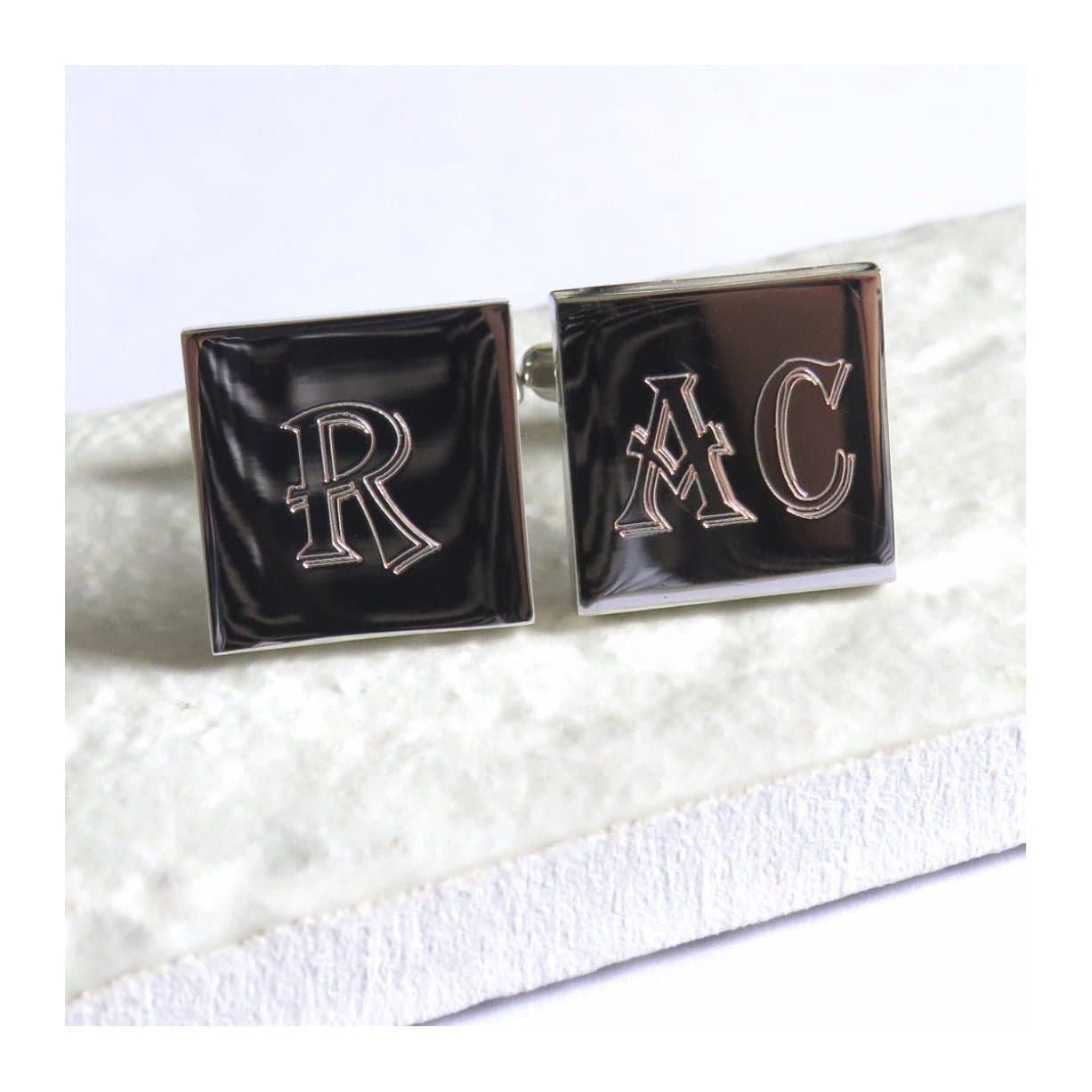Silver coloured square cufflinks with a personalised initial