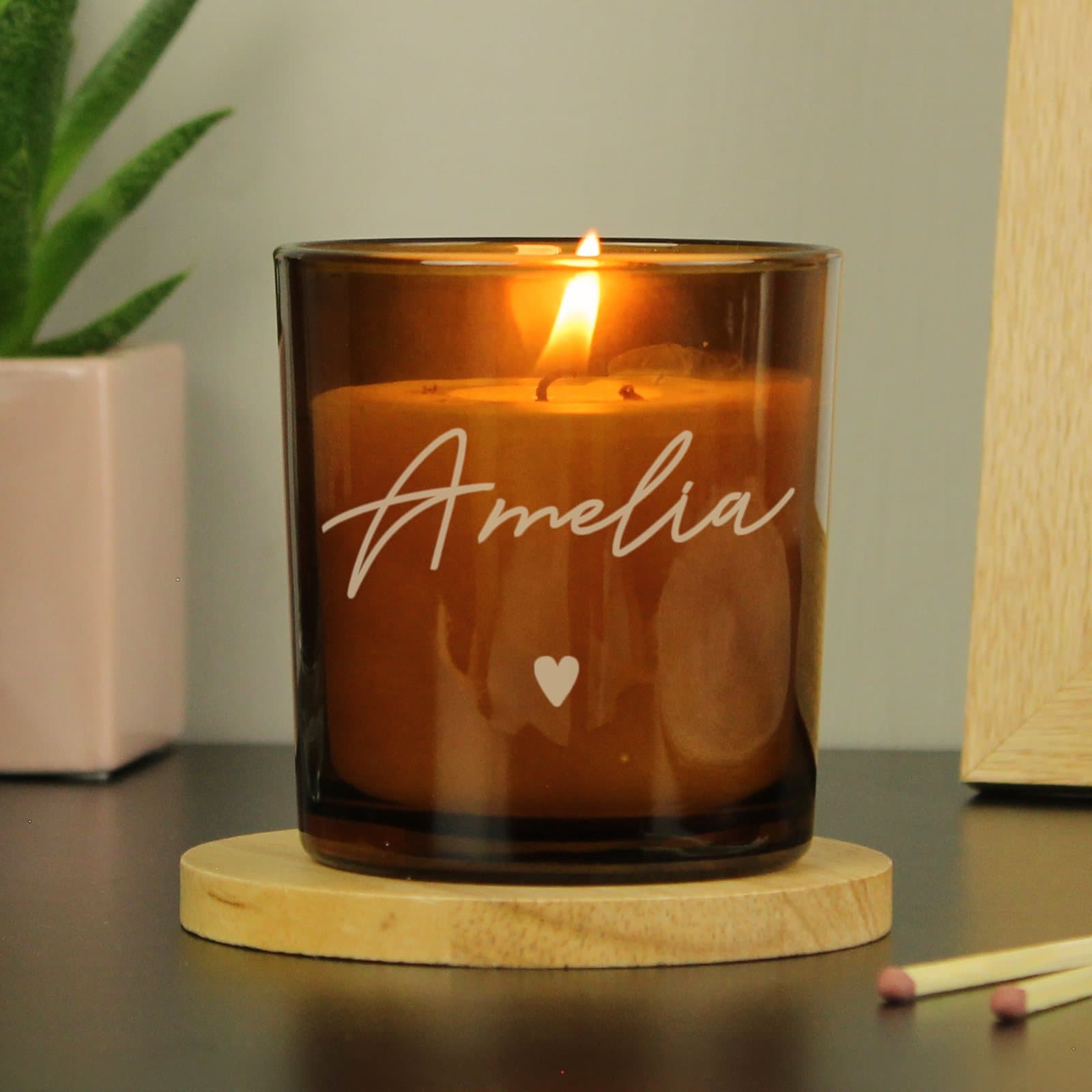 Amber glass candle jar personalised with a name