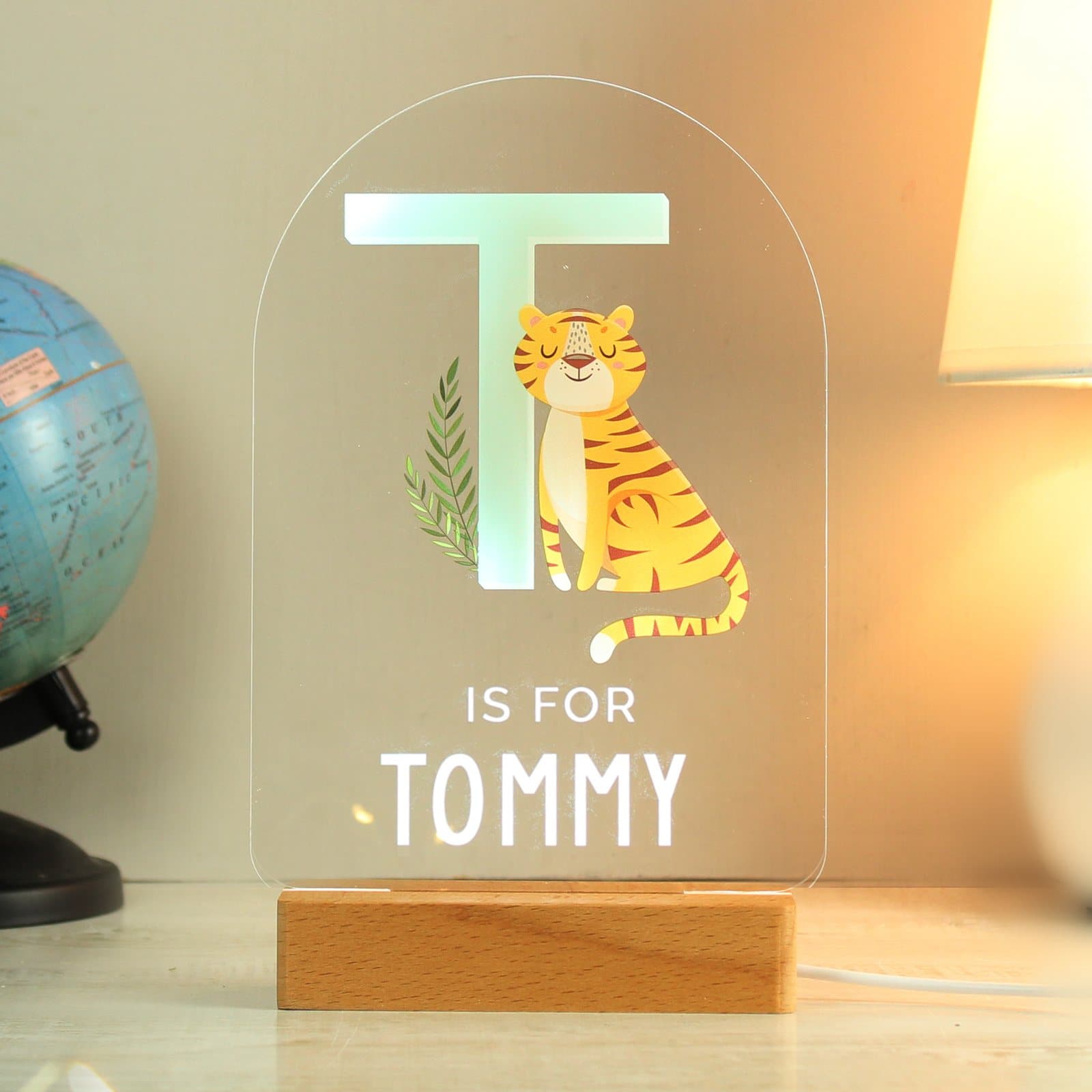 Personalised animal alphabet LED light sign on a wooden base